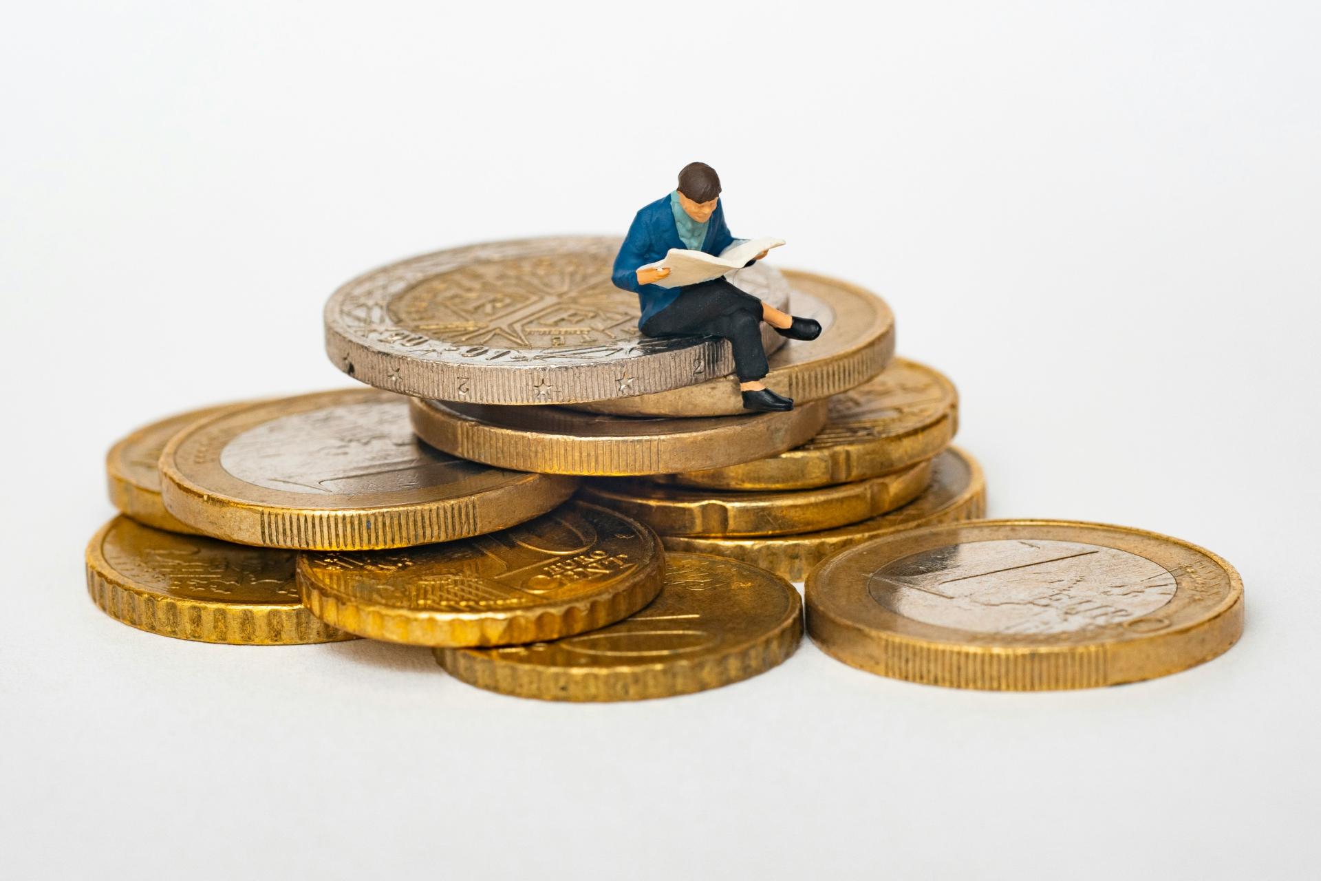 Modellfigur auf Euro-Münzen.
