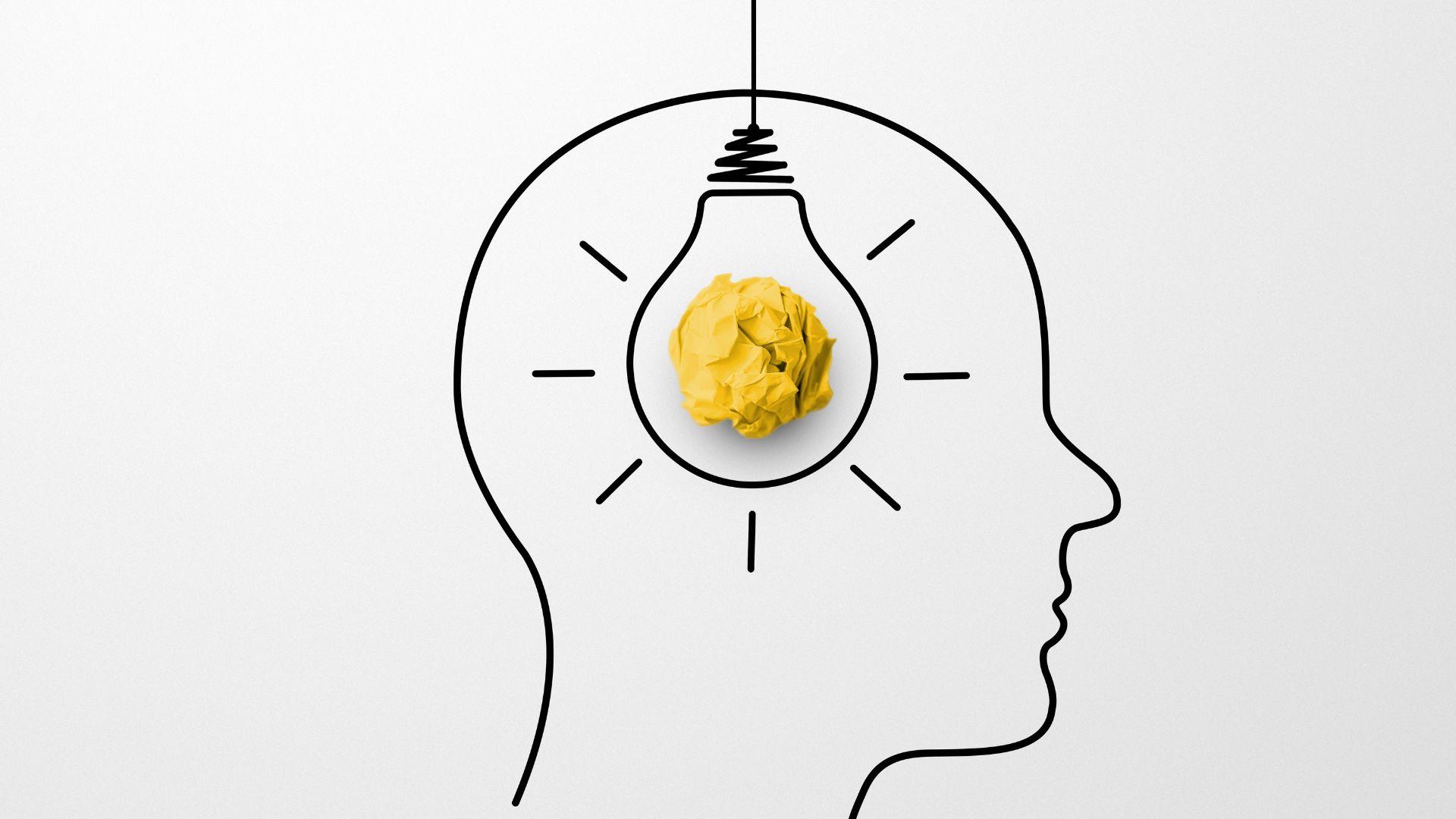 Umriss eines Kopfes mit Glühbirne in der Mitte 
